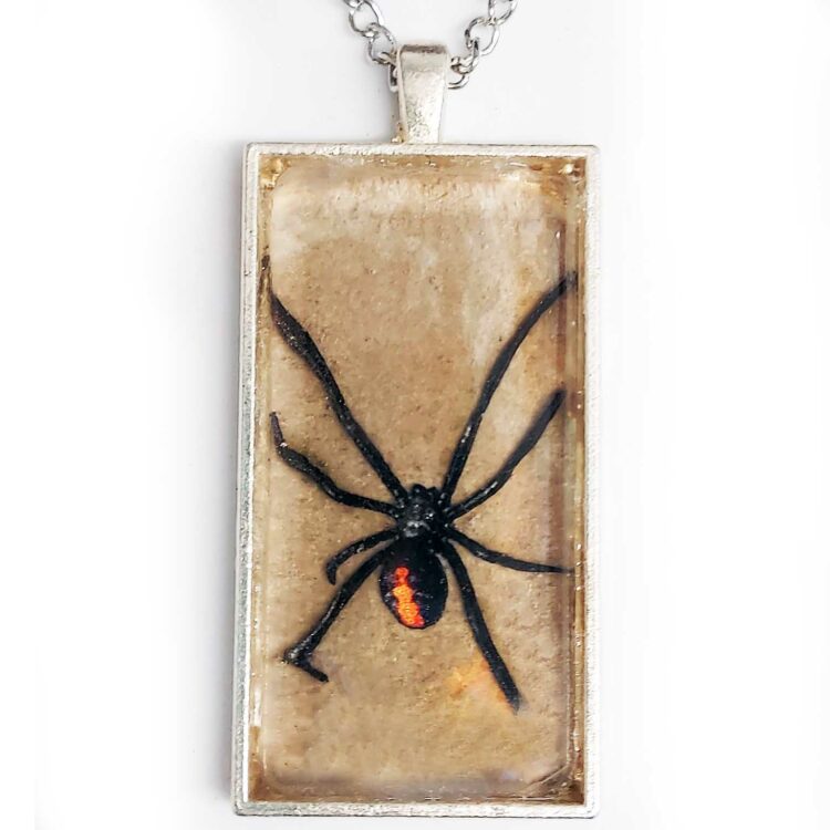 widow replica necklace desert background